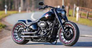 A rider cruising on a beach path with a cruiser comfort bike