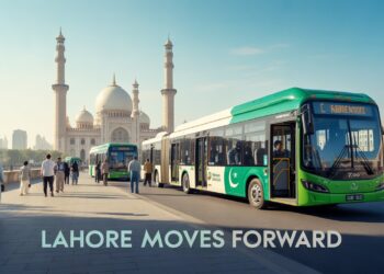 Newly launched Lahore electric bus on city road with PKR 20 fare sign
